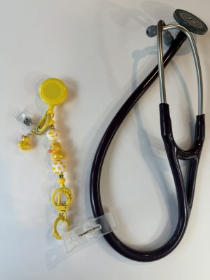 Yellow duck clip with white and yellow duck beads and yellow duck charm