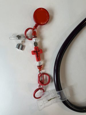 Red Jesus clip with clear beads and silver Bible charm