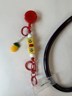 Red SpongeBob clip with pineapple charm