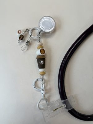 White and brown coffee clip with white coffee cup, white coffee cup, and coffee bean charm