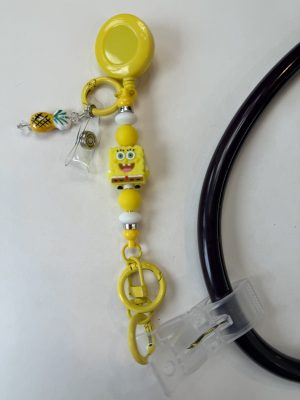 Yellow SpongeBob clip with yellow beads and pineapple charm