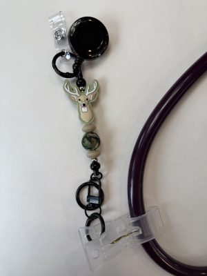 Black clip with green deer head and camouflage bead